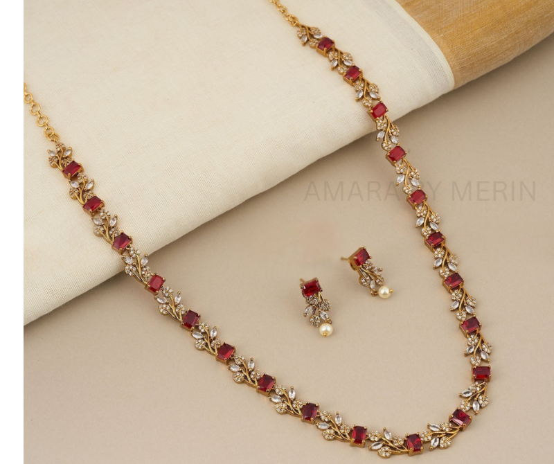 Aarohi Gold plated AD Stone Necklace(Ruby) with hanging Earrings AM13013