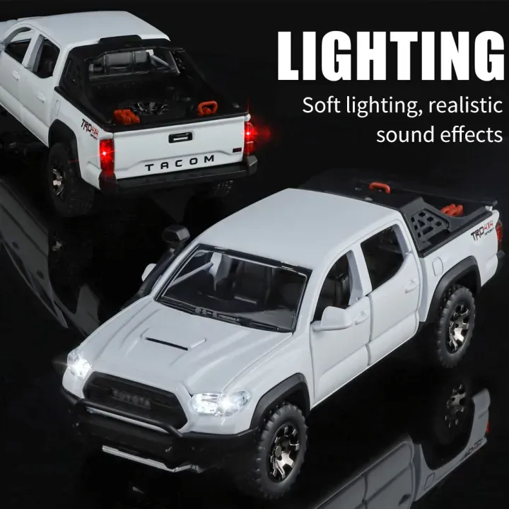 1:32 Hot Selling Toyota Tacoma pickup trucks
Diecast model car sound light open doors collector best toys KT (M343)