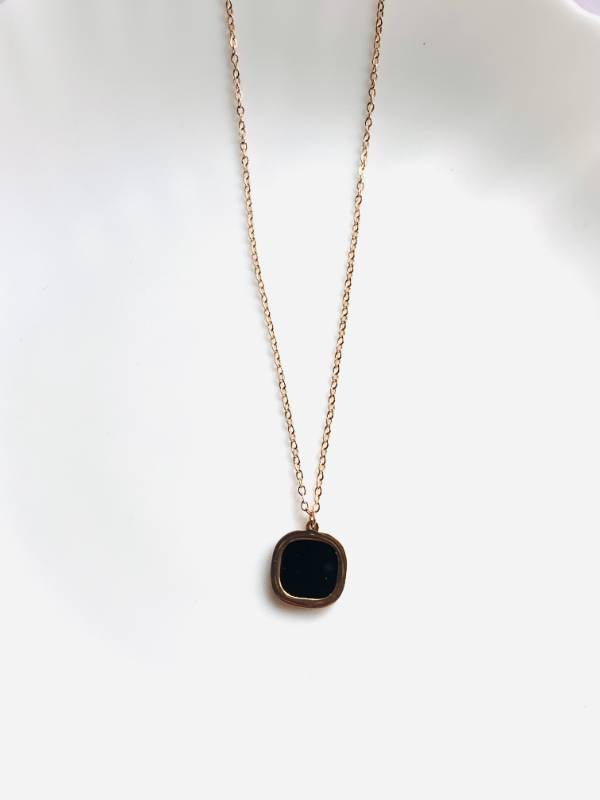 Black stone rose pendant