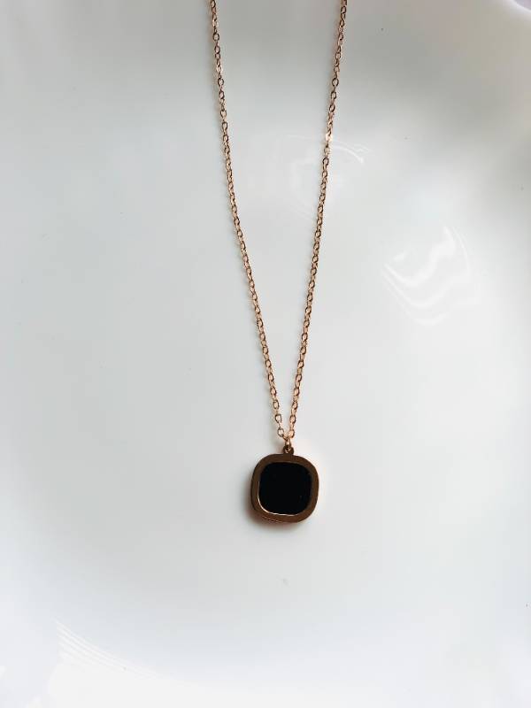 Black stone rose pendant
