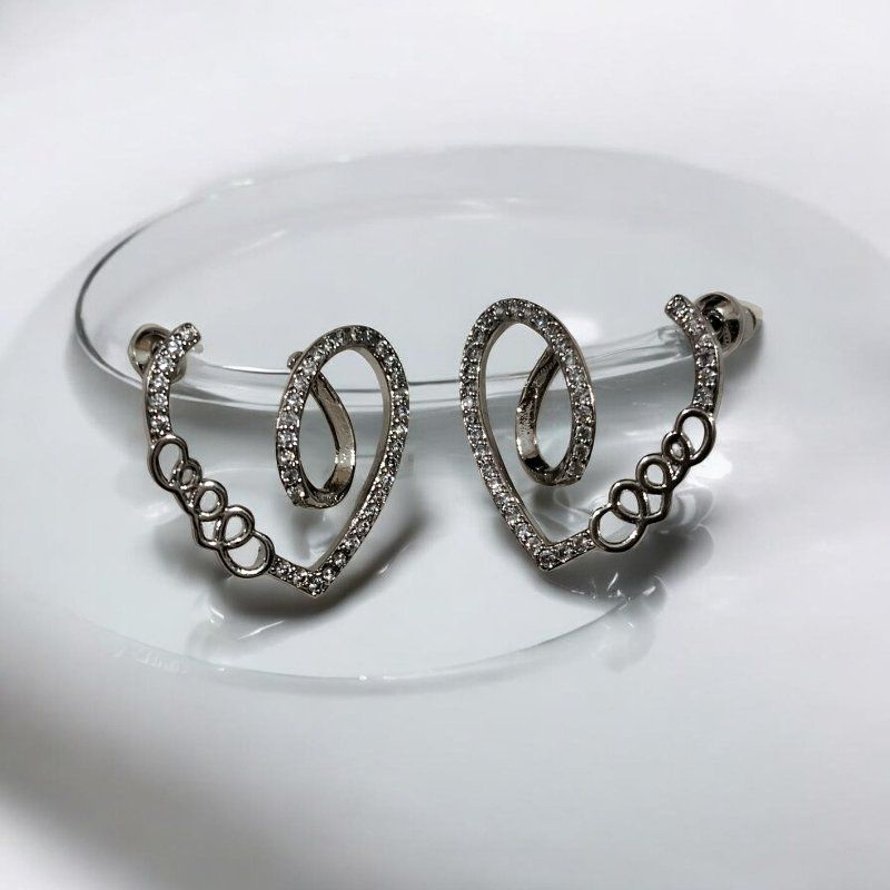 Heart-shaped sterling silver stud earings
