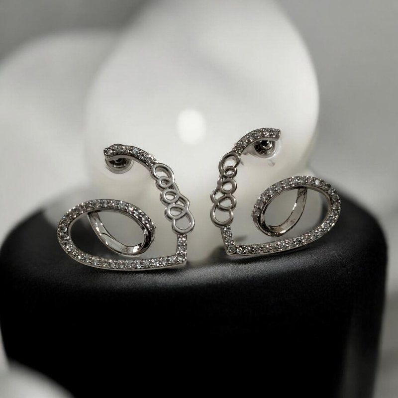 Heart-shaped sterling silver stud earings