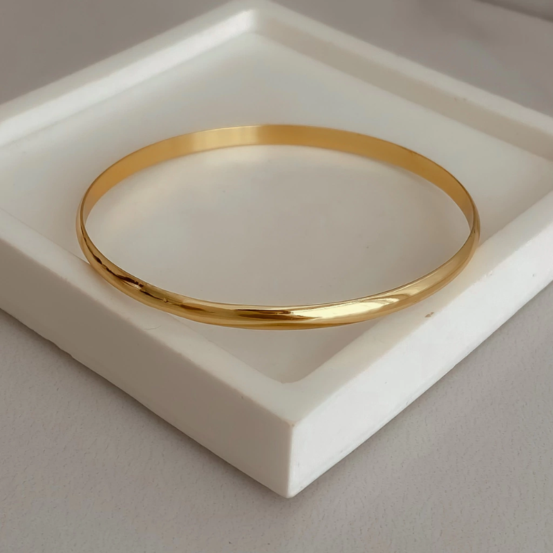 Esclava lisa 4mm. - Acero Dorado