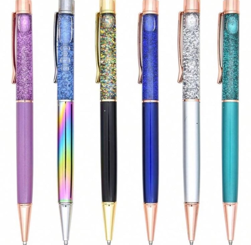 Floating sand sparkle metallic ballpoint pen.