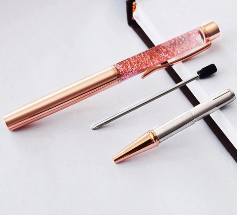 Floating sand sparkle metallic ballpoint pen.