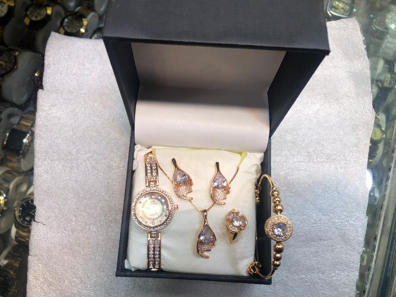 The Midnight Elegance Gold-Tone Jewelry & Timepiece Collection