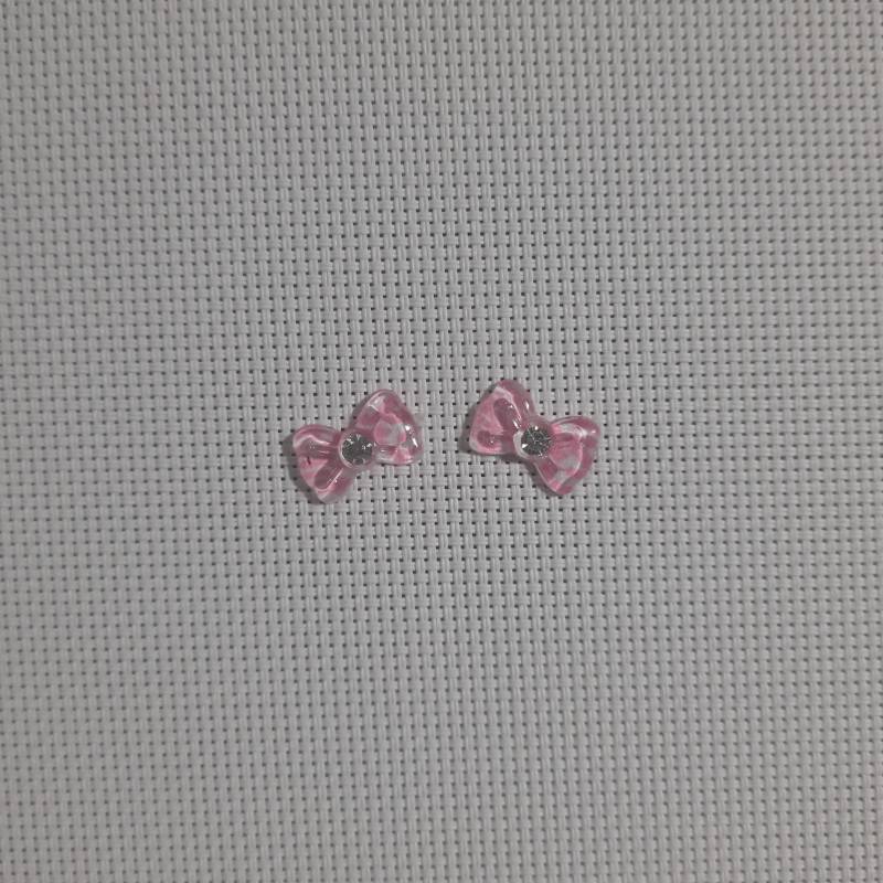 DIJE MOÑO ZEBRA ROSA 
2 UNID.