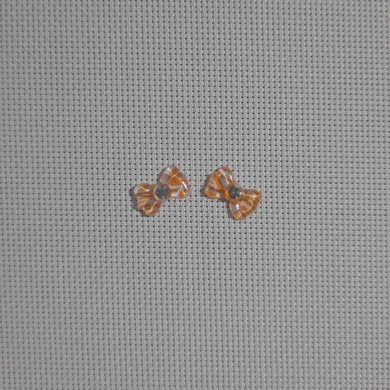 DIJE MOÑO ZEBRA NARANJA 
2 UNID.