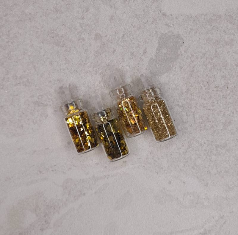 PACK GLITTER 4PCS 
DORADO