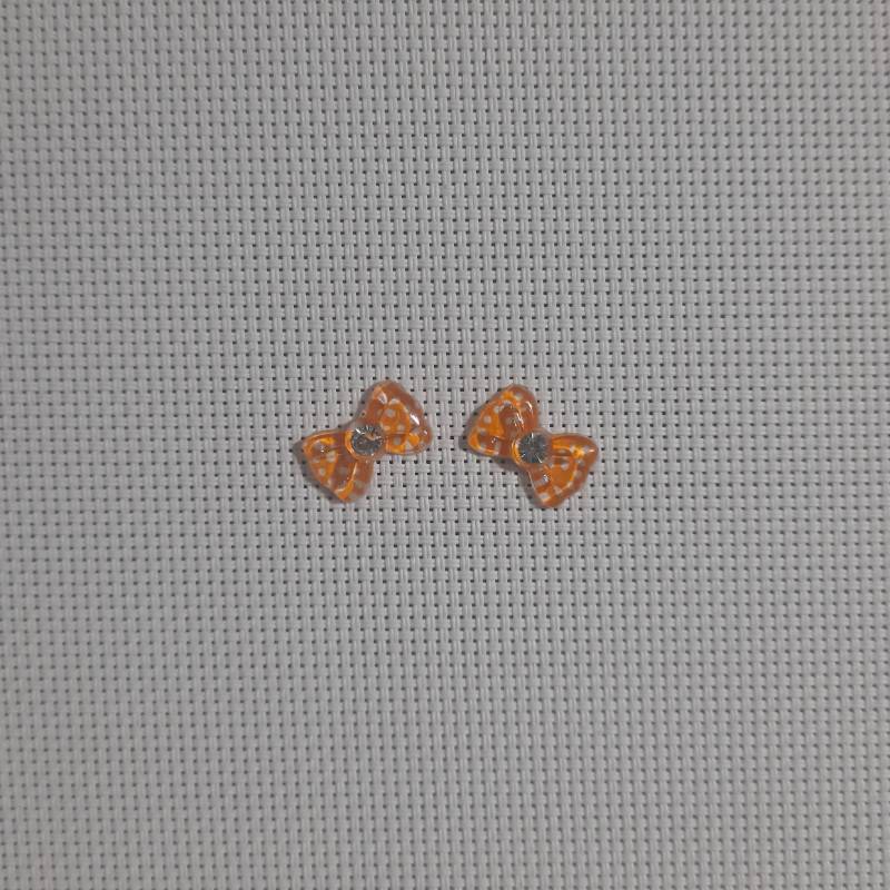 DIJE MOÑO NARANJA 
LUNARES 2 UNID.
