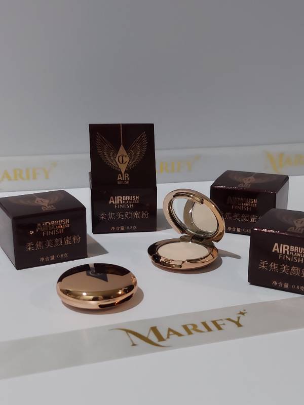 Charlotte Tilbury
Airbrush Flawless Finish Powder trial size in shade Fair- 0.8g