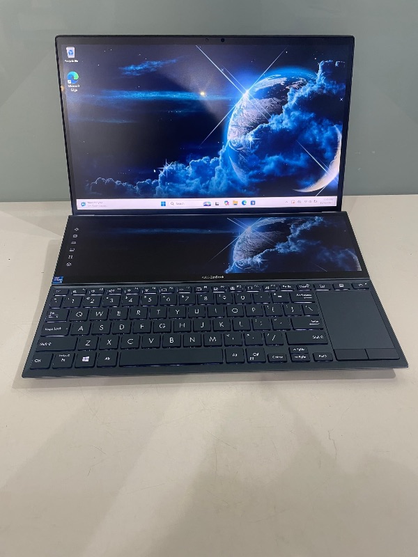 Asus Zenbook duo 14
14" *FHD Touchscreen anti-glare* Display
*12.65” HD+ Duo Screenpad secondary display*
Intel Core *i7 11th* Generation EVO Processor up to 4.7GHz
Nvidia MX450 GPU *(2GB GDDR6 Dedicated Graphics)*
*32GB* Ram
1TB SSD
Face id unlock
Thunderbolt Port
Backlit Keyboard
Celestial Blue
Laptop and Charger only