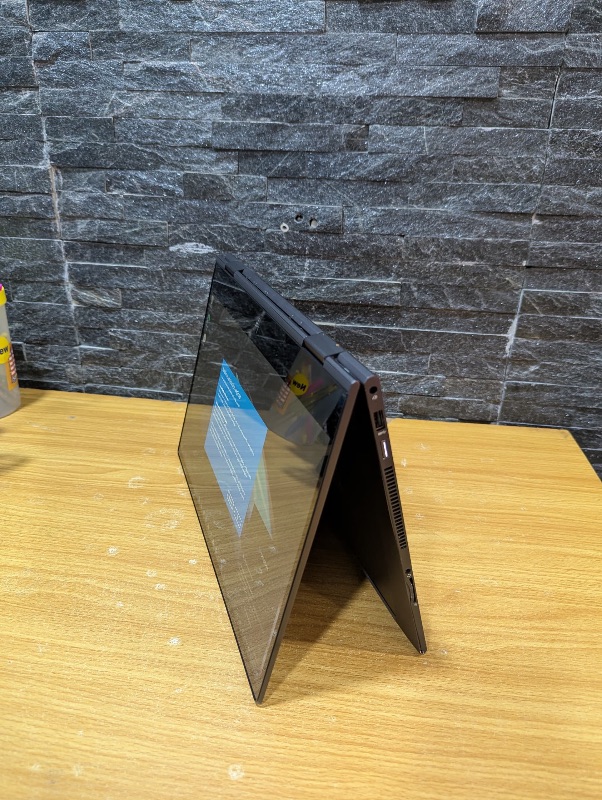 HP Envy 15 x360 Laptop 
15.6-inch Touchscreen Display 
AMD Ryzen 3  2.7GHz Processor 
8GB RAM 
512GB SSD 
2GB AMD Dedicated Graphics
Turns Tablet Mode 
Backlit Keyboard 
Laptop and Charger