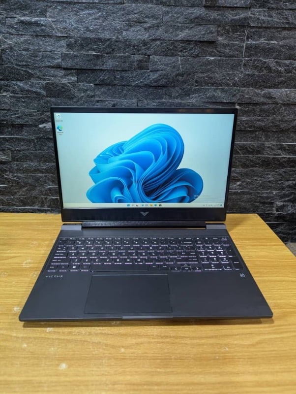 HP Victus 15 Gaming Laptop
15.6" FHD 144Hz Display 
AMD Ryzen 5 5600H( Outperforms Core i5-11th Gen)3.3GHz
8GB RAM
256GB SSD
4GB AMD Radeon RX6500M Dedicated Graphics Card 
Backlit keyboard
Laptop and Charger