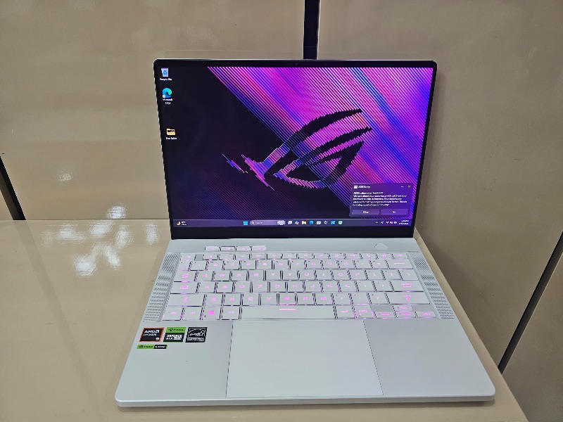 ASUS ROG Zephyrus G14 Gaming Laptop (2024)
Model Number :- GA403UV-G14.R94060
 14" 3K (2880x1800) 120Hz OLED ROG Nebula Display |l
AMD Ryzen 9 8945HS ||
16GB RAM
1TB SSD
NVIDIA GeForce RTX 4060
8GB GDDR6 Dedicated Graphics
RGB Keyboard lighting
Color:-  Platinum White
Wi-Fi 6
Laptop and charger only