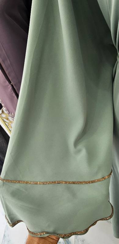 Wrap Yourself in Serenity:Sage Elegance Abaya