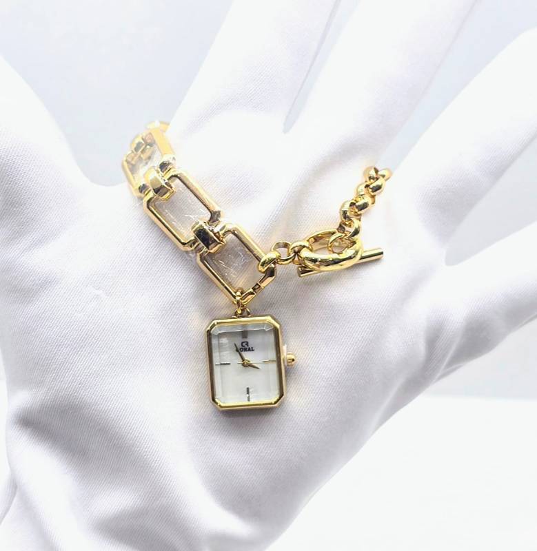 Coral Queen:Fancy Metal Watch for the Modern Woman