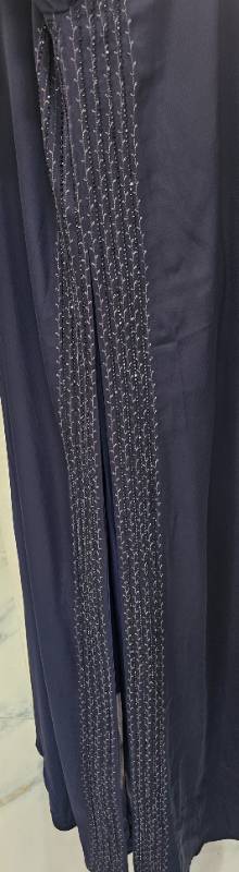 Elegance redefined:The Blue Bliss Abaya with fleet and stone embroidery