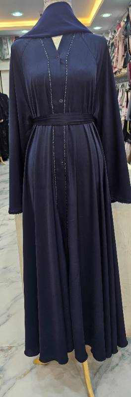Elegance Unfolds:Navy Bloom Abaya