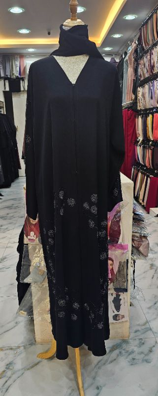 Black Abaya: Flowing Nidha Fabric & Silver Flower Detail