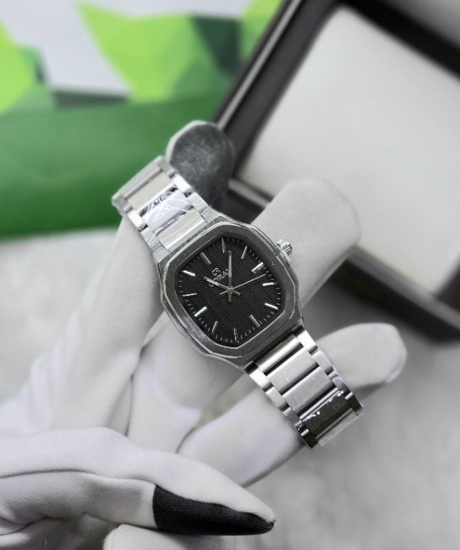 Coral Facet Timepiece Precision on Wrist