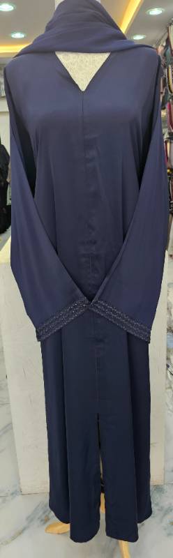Elegance redefined:The Blue Bliss Abaya with fleet and stone embroidery