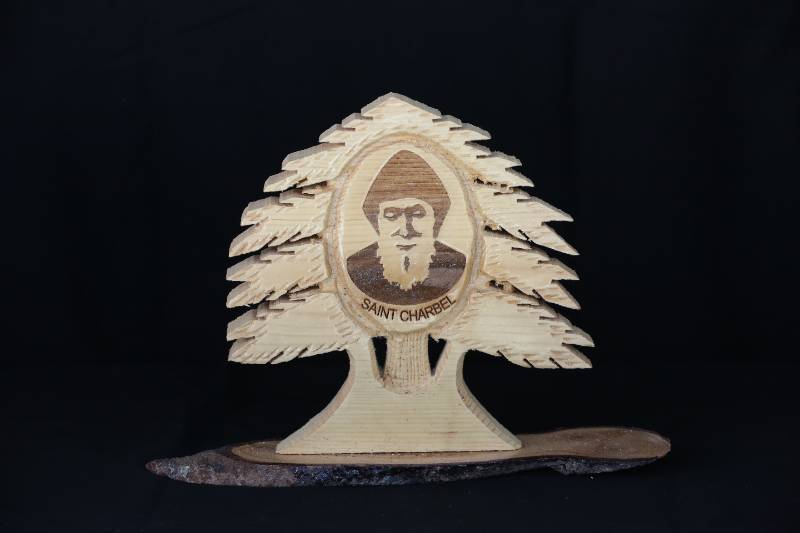 Wooden Statue of Saint Charbel with Cedar Tree Design
تمثال خشبي للقديس شربل بتصميم أرز لبنان
