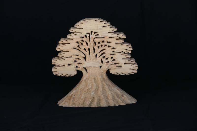Handcrafted Cedar Wooden Tree Sculpture – Natural Wood Art Decor
منحوتة شجرة ارز خشبية يدوية – ديكور فني طبيعي من الخشب