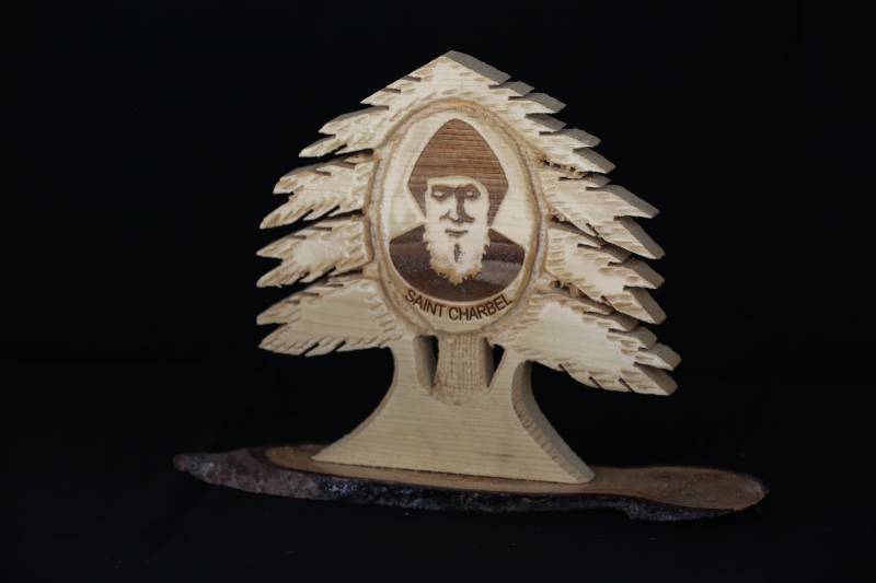 Wooden Statue of Saint Charbel with Cedar Tree Design
تمثال خشبي للقديس شربل بتصميم أرز لبنان