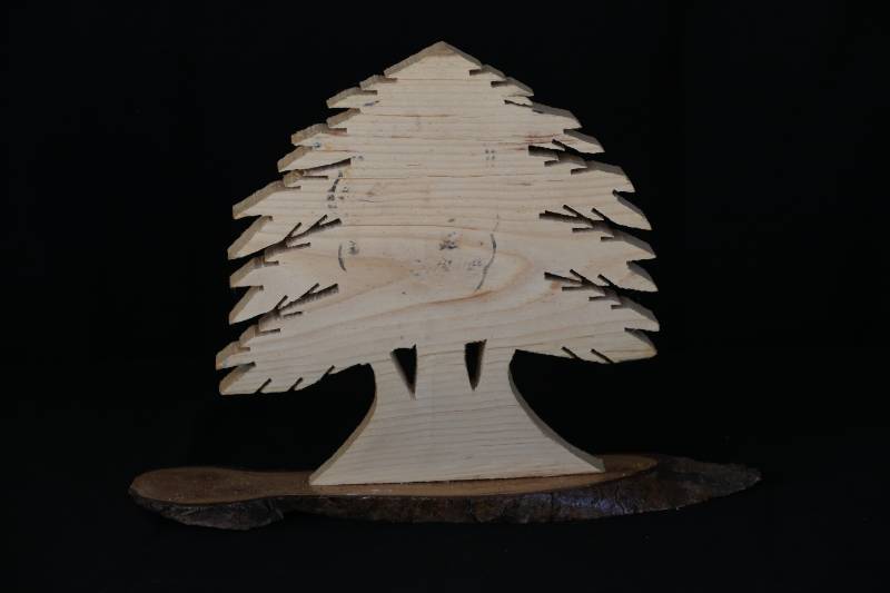 Wooden Statue of Saint Charbel with Cedar Tree Design
تمثال خشبي للقديس شربل بتصميم أرز لبنان