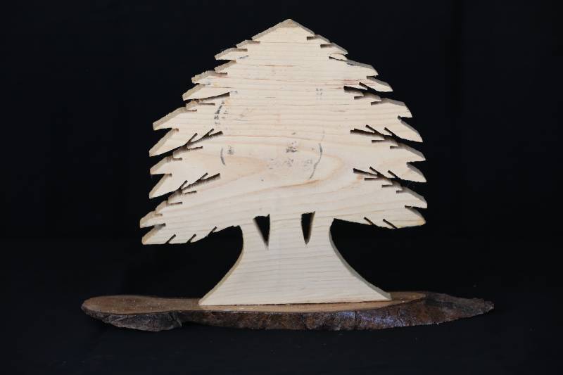 Wooden Statue of Saint Charbel with Cedar Tree Design
تمثال خشبي للقديس شربل بتصميم أرز لبنان