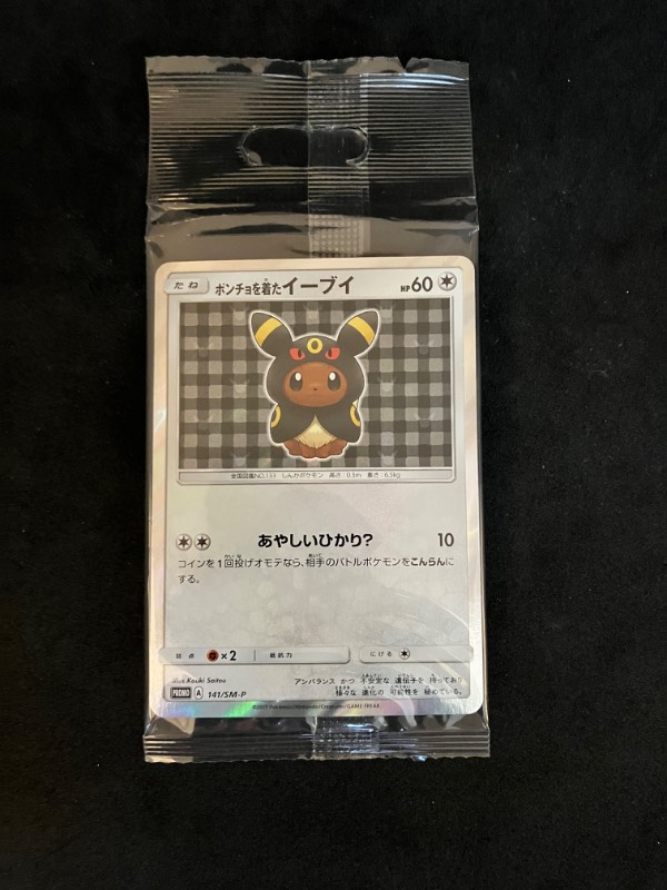 2017 Eevee Mega Campaign Eevee Wearing Umbreon Poncho 141/SM-P Promo Holo Pokemon Card NM/MINT