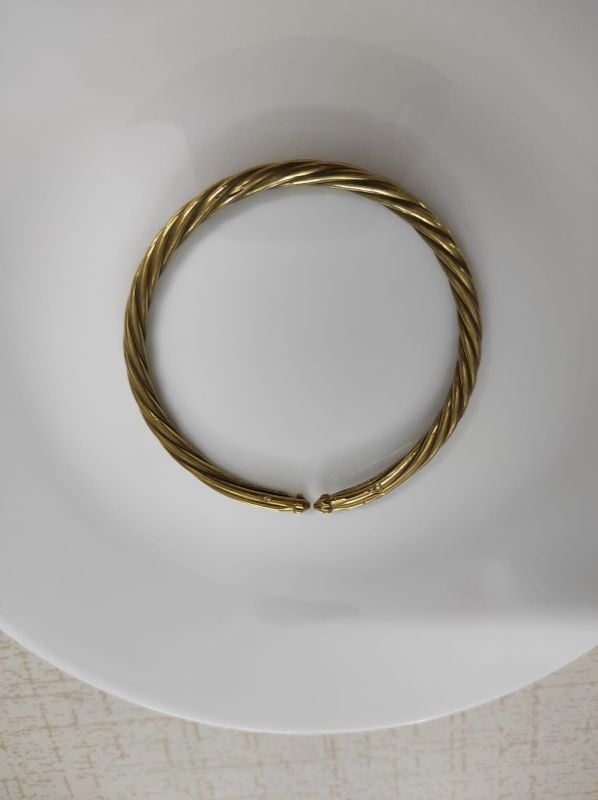 Twisted golden brass bracelet
