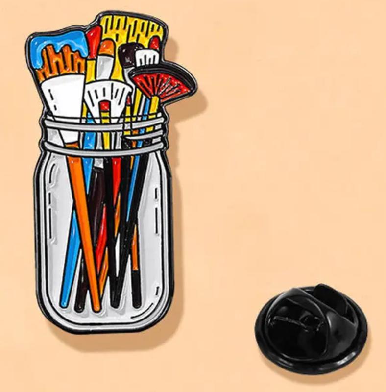 Bote de Pinturas Y Pinceles