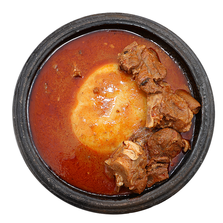 Fufu with light soup and goat/chicken