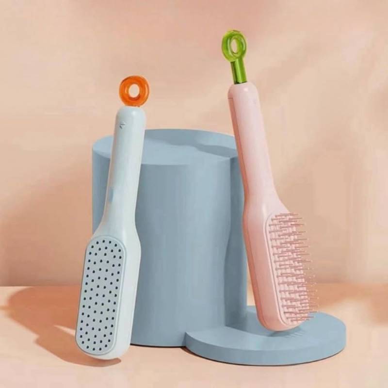 Self cleaning hair brush