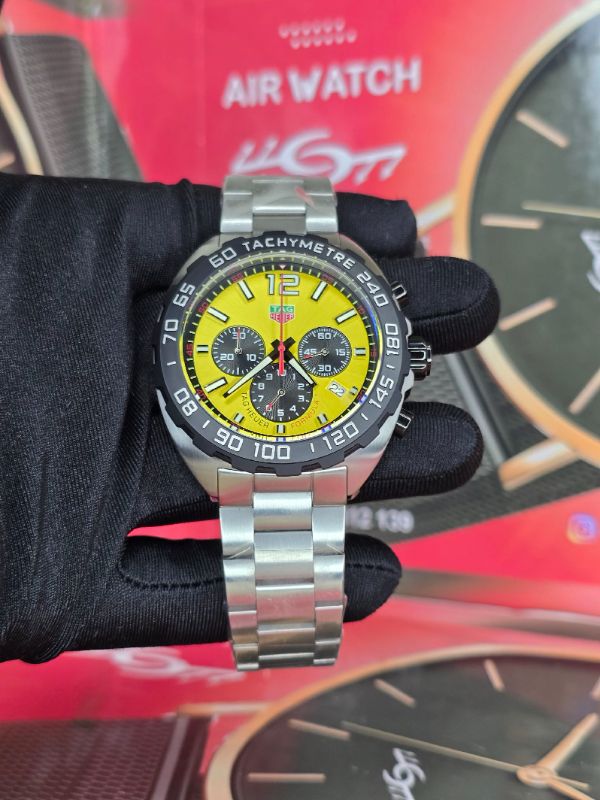 TAG HEUER
Stainless Steel Yellow Dial Formula 1 43 MM Chronograph Quartz Watch CAZ101AM w/ Box & Papers