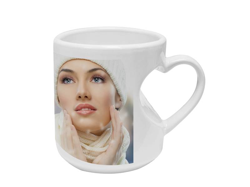 TAZAS BLANCAS CON ASAS EN FORMA DE CORAZON 11ONZ SUBLIMACION
