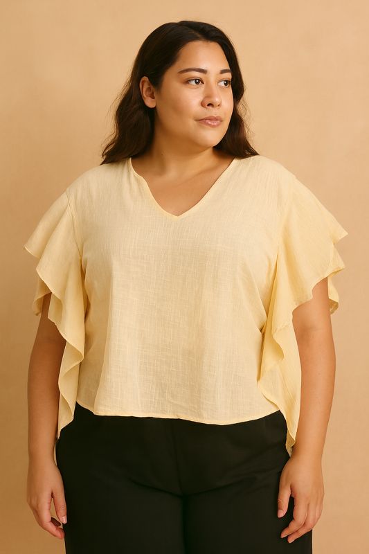 Blusa con volantes amplios