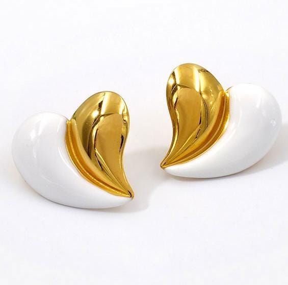 Topos de corazón dorado y blanco