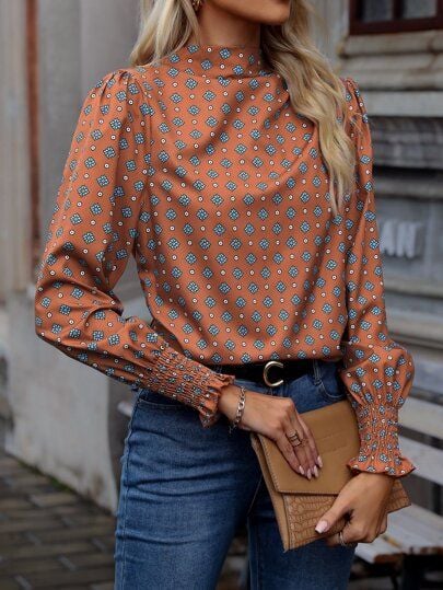 Blusa de manga larga con cuello alto con rombos