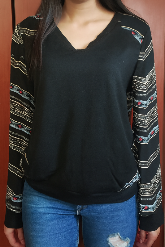 Blusa de manga con  franjas horizontales