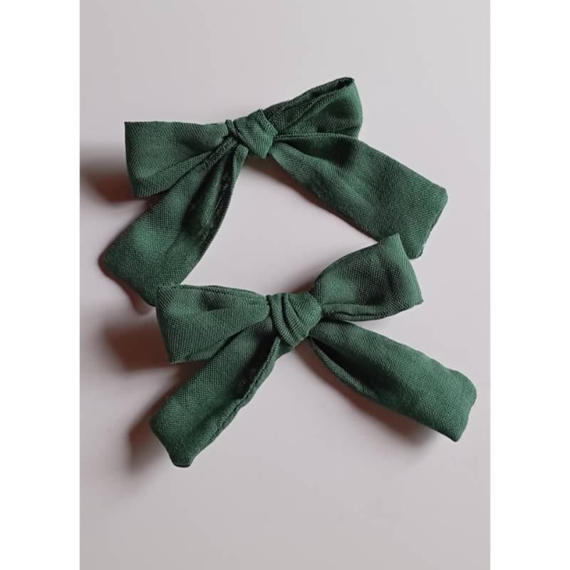 Moños de niña verde