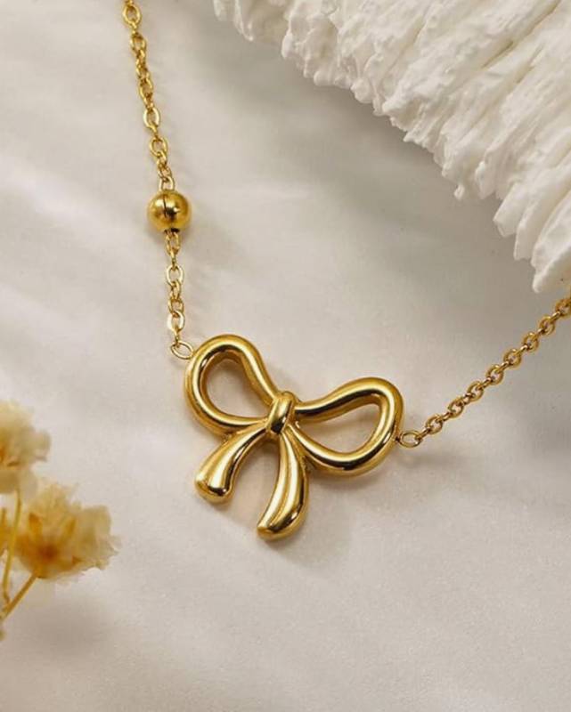Infinity bow pendant