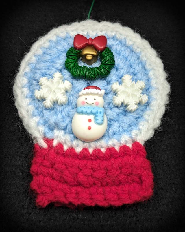 Crochet Snowglobe Ornament (F) - Red base: Green/Red Xmas Wreath and Kawaii Snowman with 2 snowflakes icons in Globe