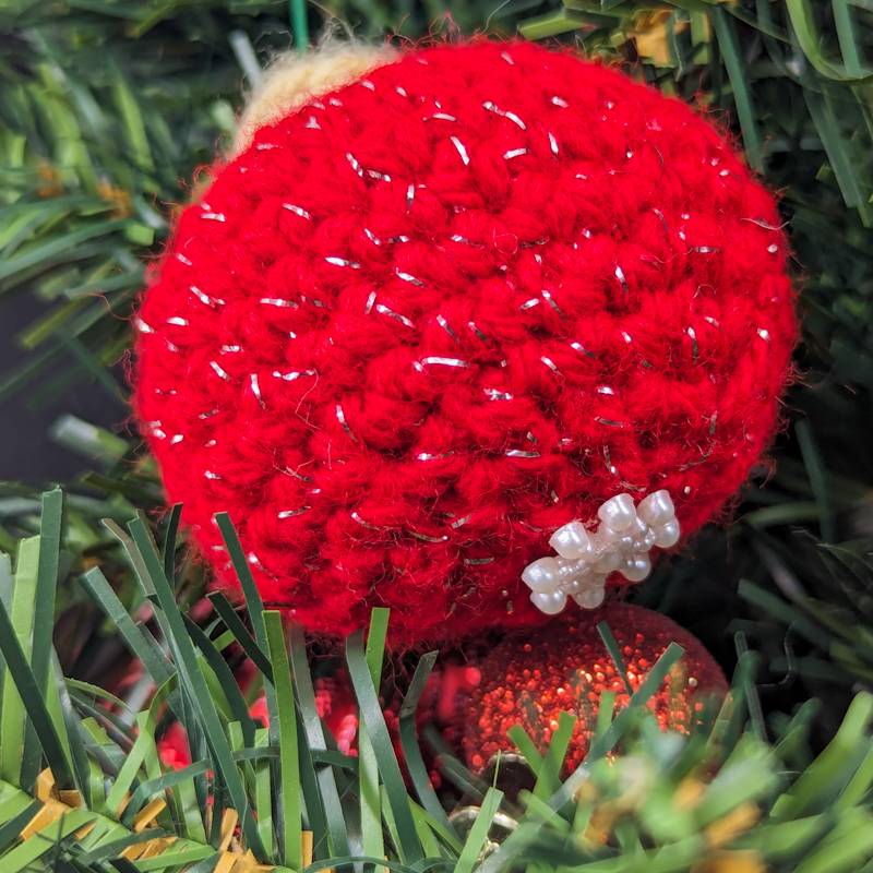 Crochet Bobble Ornament (Red-Foil Yarn with Pearlescent Acrylic Snowflake accent)