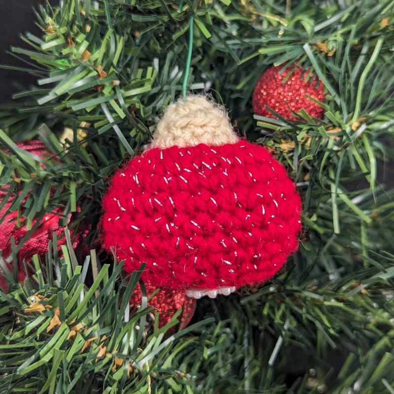 Crochet Bobble Ornament (Red-Foil Yarn with Pearlescent Acrylic Snowflake accent)