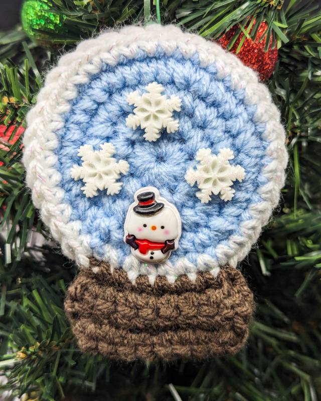 Crochet Snowglobe Ornament (B) - Brown base: Kawaii Snowman with 3 White Snowflake icons in Globe