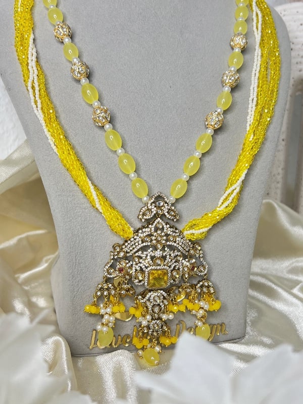 Tyani Kundan With Jaipuri Stones Long Set
