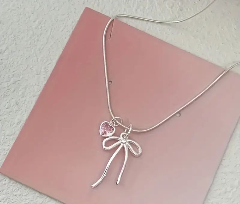 Imported Bow and moving Heart Necklace